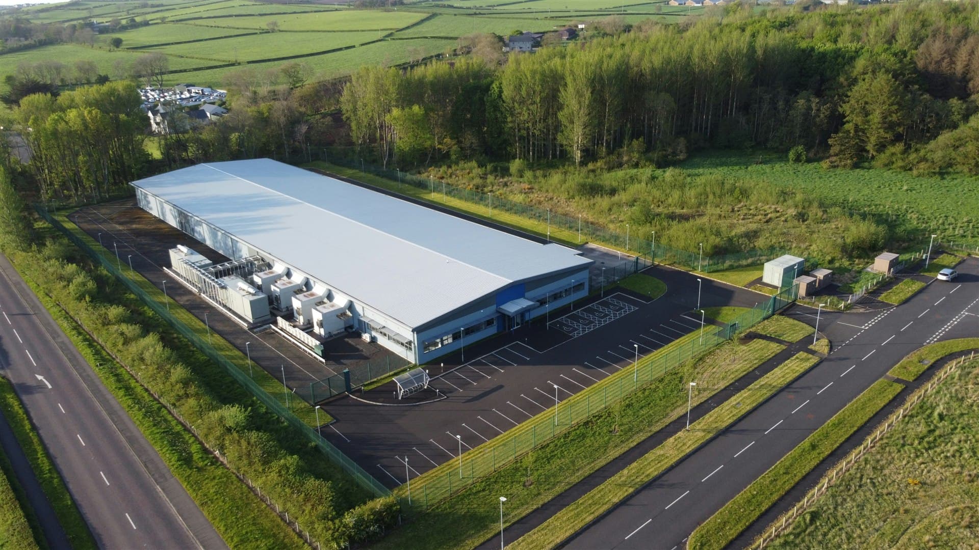Aerial view of a data-centre facility and its surrounding landscape