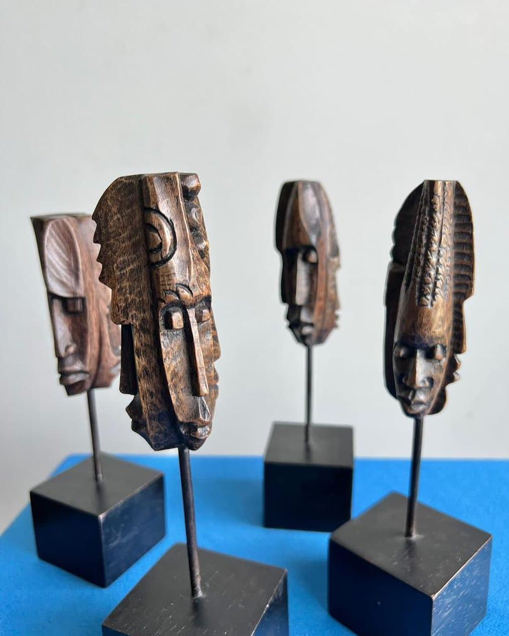 Close view of a hand-carved wooden wall mask