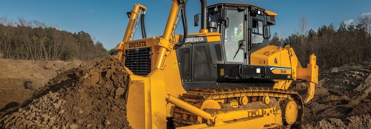 Yellow bulldozer moving earth