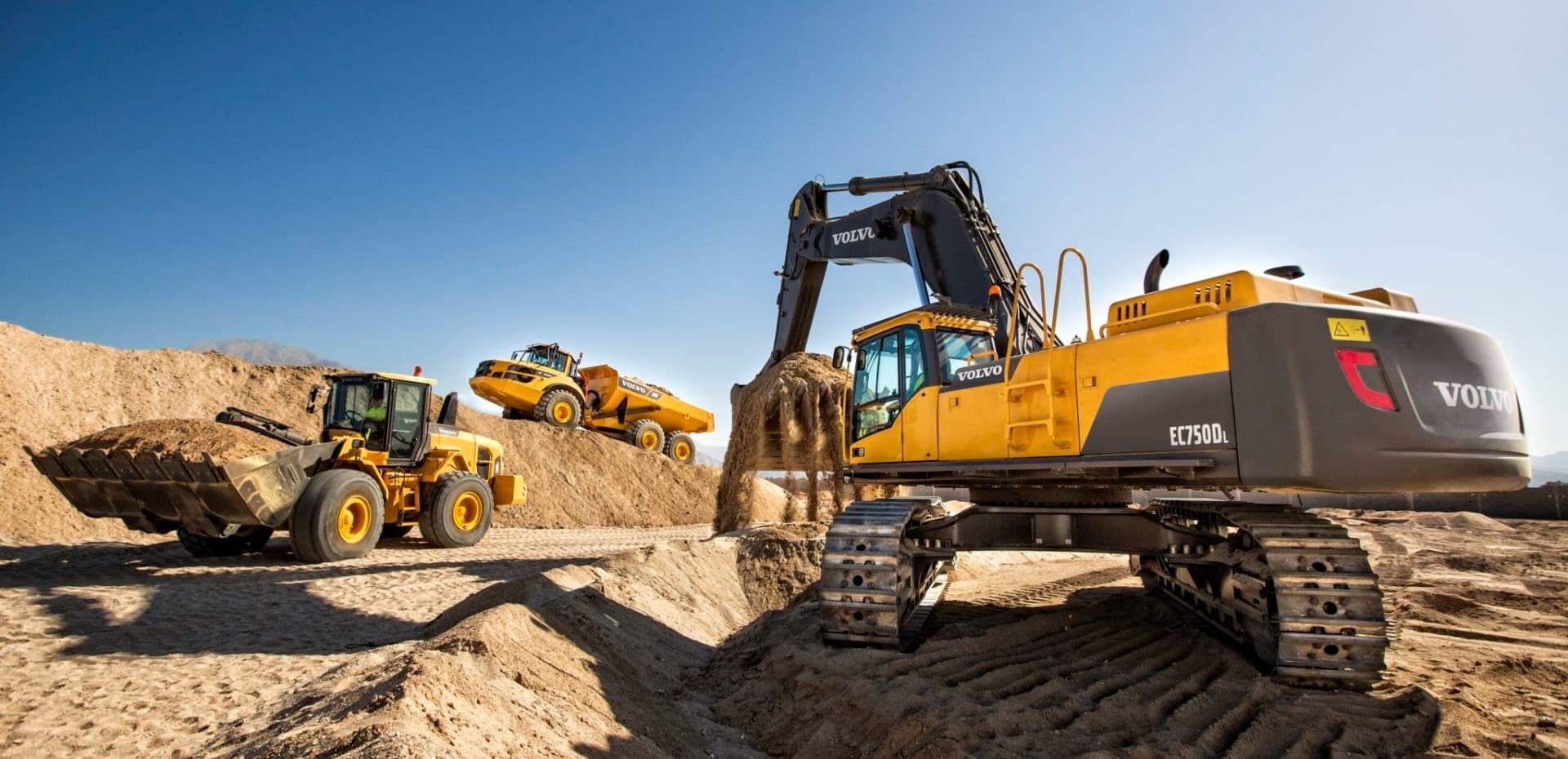 Excavator and construction equipment at a quarry