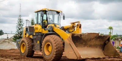 Yellow wheel loader at a work site